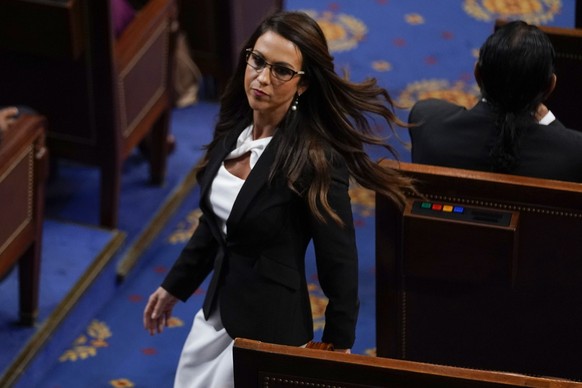 Rep. Lauren Boebert, R-Colo., walks in the House chamber as the House meets for a second day to elect a speaker and convene the 118th Congress in Washington, Wednesday, Jan. 4, 2023. (AP Photo/Andrew  ...