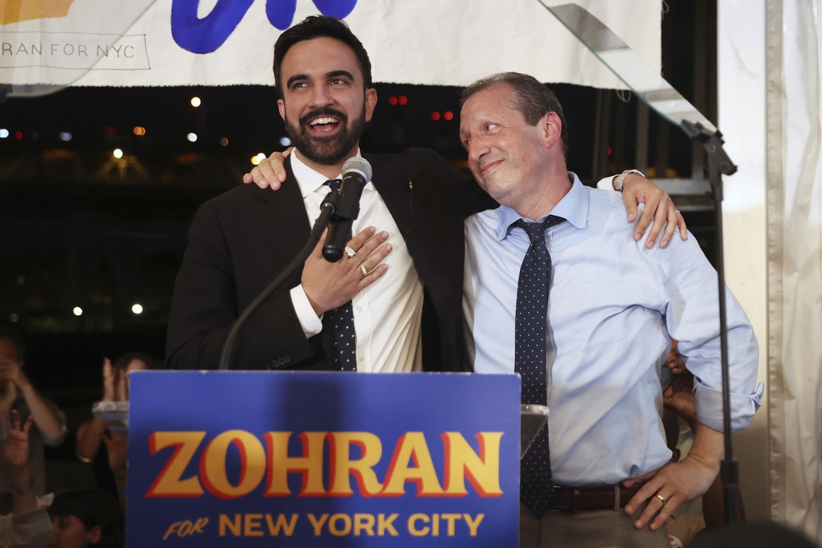 Democratic mayoral candidate Zohran Mamdani, left, speaks on stage with fellow candidate Comptroller Brad Lander at his primary election party, Wednesday, June 25, 2025, in New York. (AP Photo/Heather ...