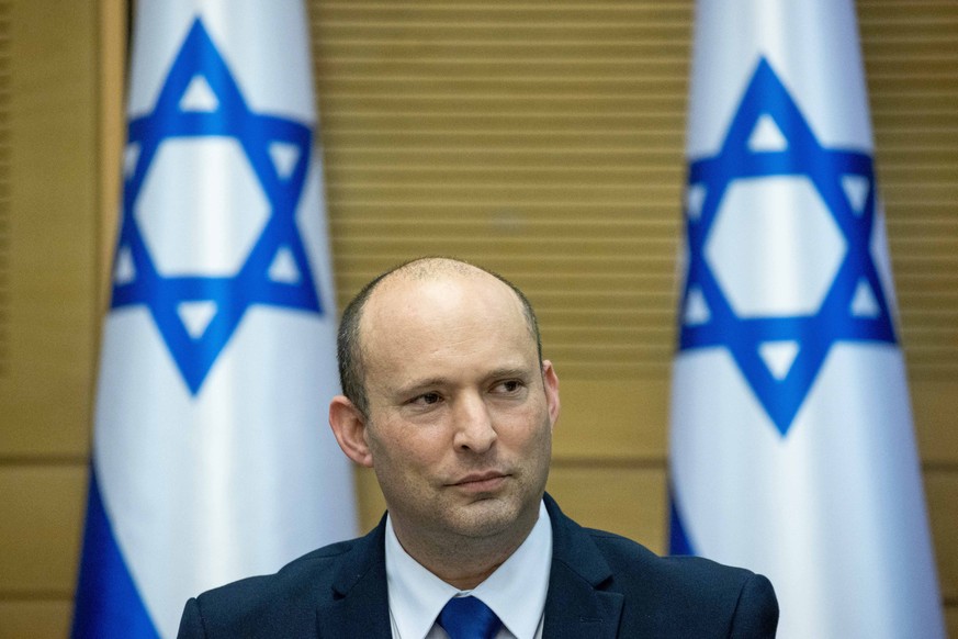 210613 -- JERUSALEM, June 13, 2021 -- Israel s new Prime Minister Naftali Bennett attends the first cabinet meeting of the new coalition government in Jerusalem, on June 13, 2021. Naftali Bennett, lea ...