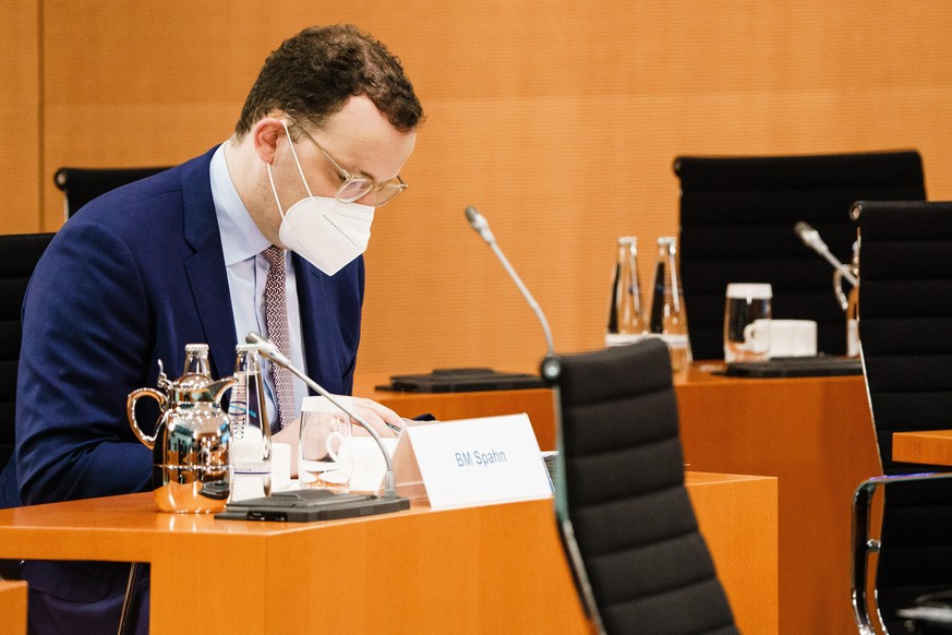 BERLIN, GERMANY - JUNE 02: German Health Minister Jens Spahn wears a face mask, as he sits on his place, during the beginning of the weekly meeting of the German Federal cabinet in the conference hall ...