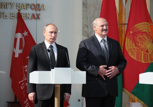 ITAR-TASS: MINSK, BELARUS. JULY 2, 2014. President of Russia Vladimir Putin (L) and Belarusian president Alexander Lukashenko visit the Minsk-based Museum of the History of Great Patriotic War (WWII). ...