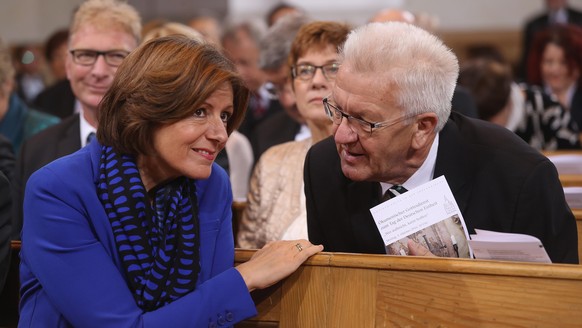 DRESDEN, GERMANY - OCTOBER 03: Governor of Rhineland-Palatinate Malu Dreyer (L) and Governor of Baden-Wuerttemberg Winfried Kretschmann arrive for a commemoratory service at the Frauenkirche church du ...