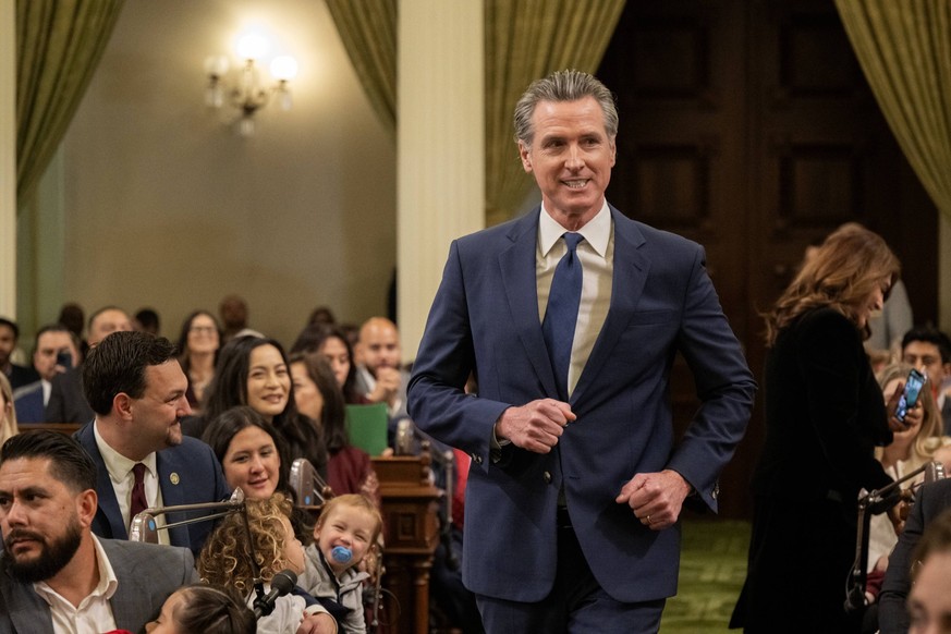 December 2, 2024, Sacramento, Ca, USA: Gov. Gavin Newsom runs down the aisle during the California State Assembly Organizational Session and Swearing-in of Member at the State capitol on Monday, Dec.  ...