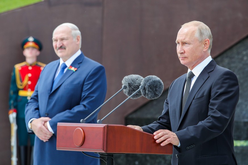 TVER REGION, RUSSIA - JUNE 30, 2020: Belarus President Alexander Lukashenko and Russia s President Vladimir Putin L-R front attend a ceremony to unveil the Rzhev Memorial to the Soviet Soldier near th ...