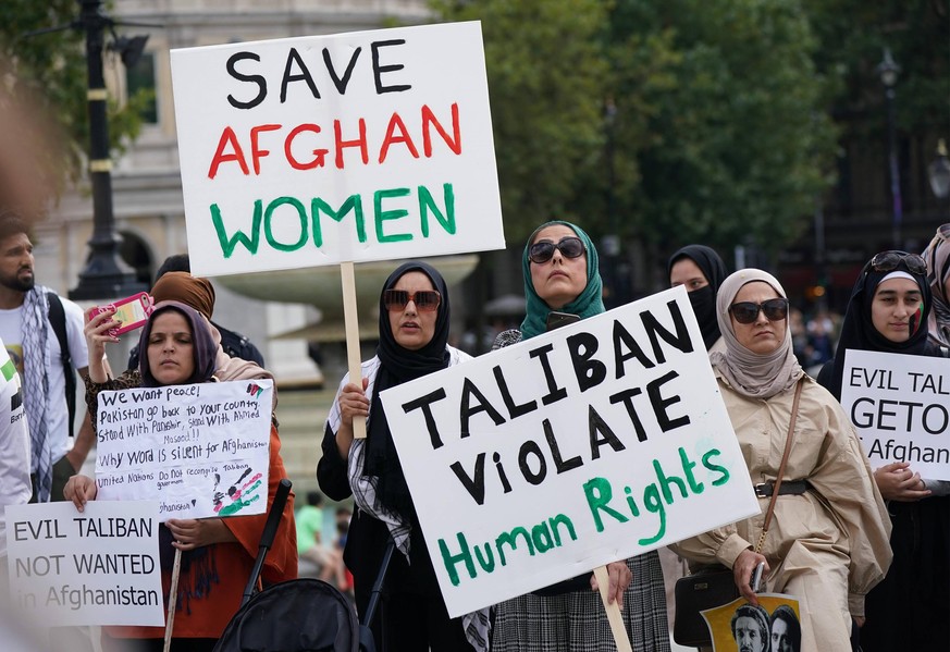 October 14, 2021, London, UK: File photo dated 12/09/21 of people at an Afghan solidarity rally in Trafalgar Square, London, to oppose the Taliban. Many Afghan women could die because of Taliban gende ...