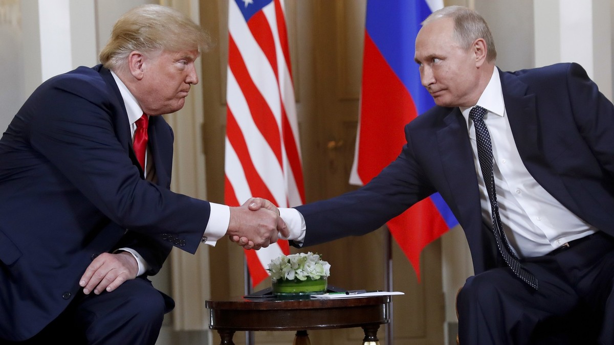 FILE - President Donald Trump, left, and Russian President Vladimir Putin shake hands at the beginning of a meeting at the Presidential Palace in Helsinki, Finland, July 16, 2018. (AP Photo/Pablo Mart ...