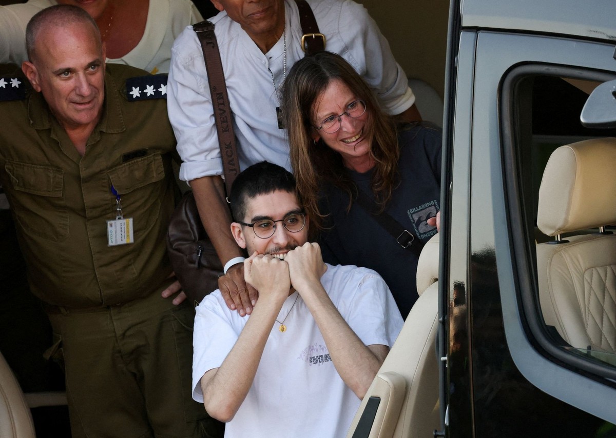 Released hostage Evyatar David, who was kidnapped during the deadly October 7, 2023 attack by Hamas and taken to Gaza, reacts upon arrival at the site of Rabin Medical Center-Beilinson Hospital, amid  ...