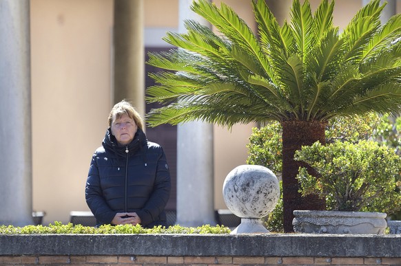 Angela Merkel the ex-chancellor of germany on a terrace of a Roman palace overlooking St. Peter&#039;s Square, sees the ceremony conducted by Pope Francis on Palm Sunday Rome (Italy) 10 April 2022 Pop ...