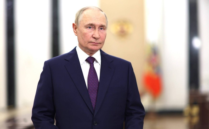 August 12, 2024. - Russia, Moscow. - Russian President Vladimir Putin delivers an address via video link during the opening of the Army 2024 International Military and Technical Forum at the Patriot C ...