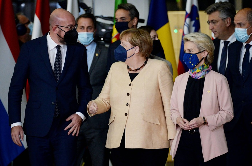 Belgium EU Summit 6677850 21.10.2021 From left, European Council President Charles Michel, German Chancellor Angela Merkel, European Commission President Ursula von der Leyen and members of the Europe ...