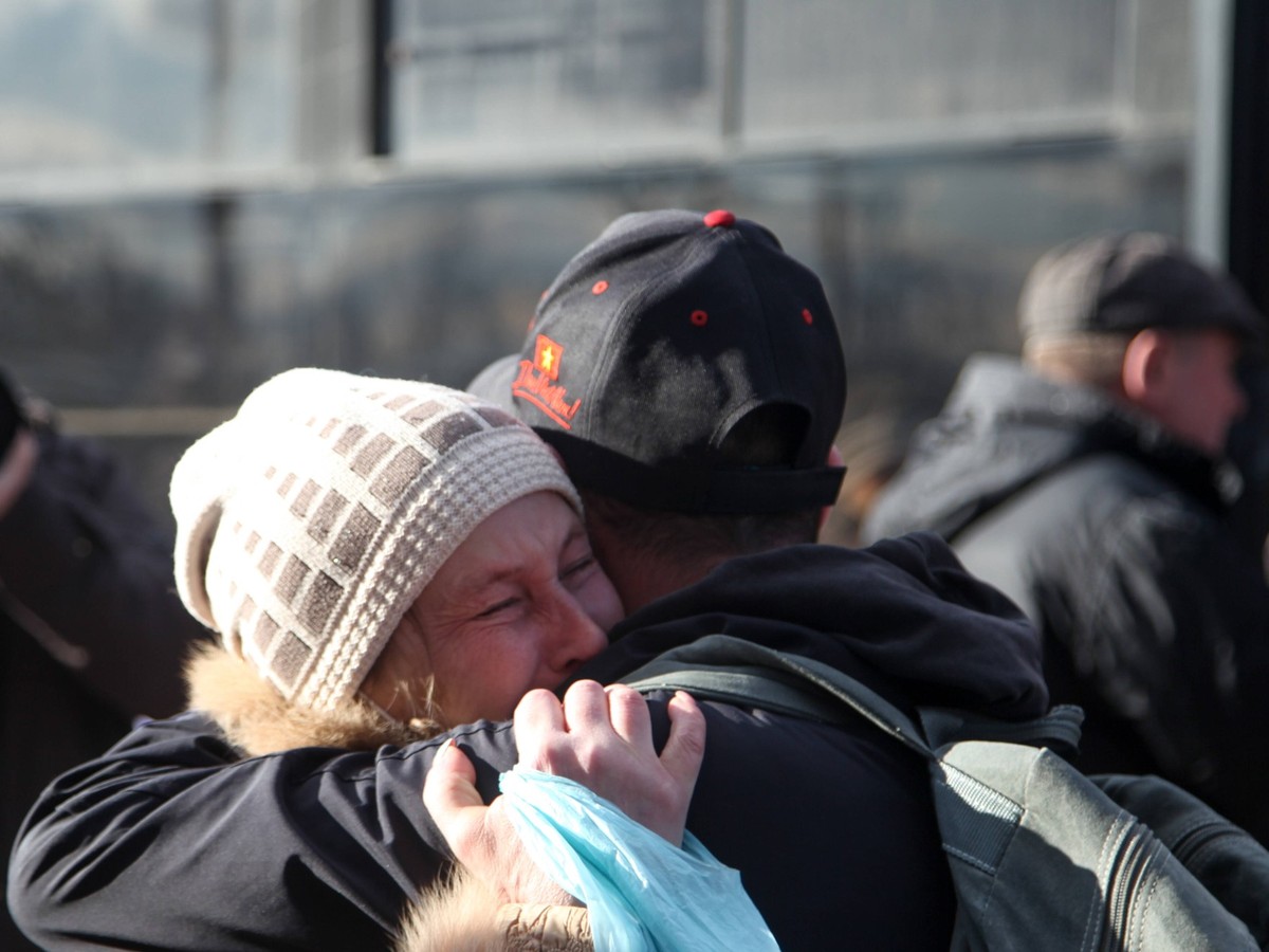 DONETSK, UKRAINE - FEBRUARY 21, 2022: Conscripts are seen off by their families outside a military enlistment office of the Donetsk People s Republic at the Ivan Franko Community Center. As tension es ...