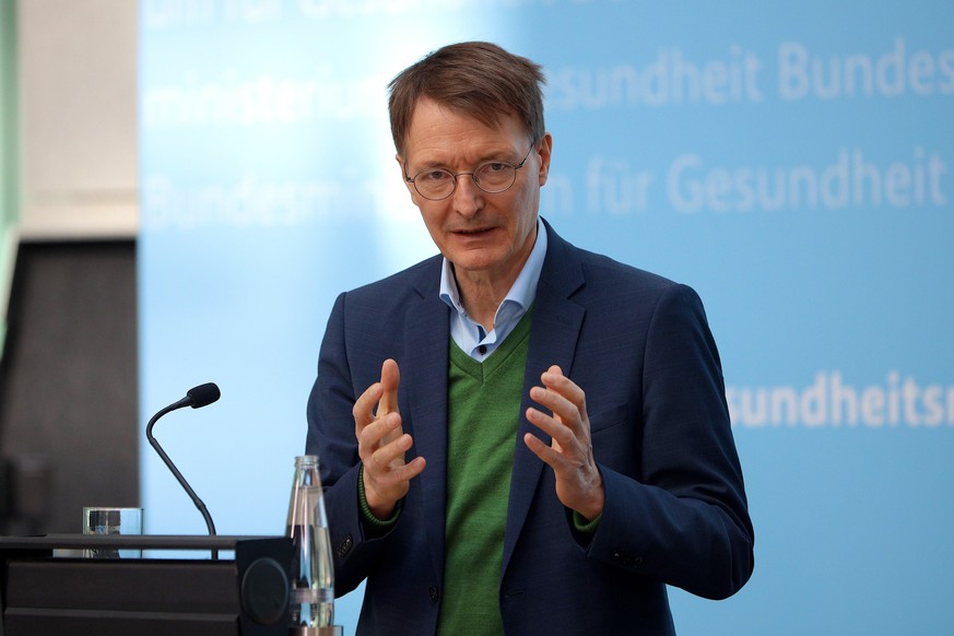 BERLIN, GERMANY - MARCH 9: German Health Minister Karl Lauterbach speaks to the media to announce a change to Germany&#039;s infection prevention law, during the coronavirus pandemic, in the Federal M ...