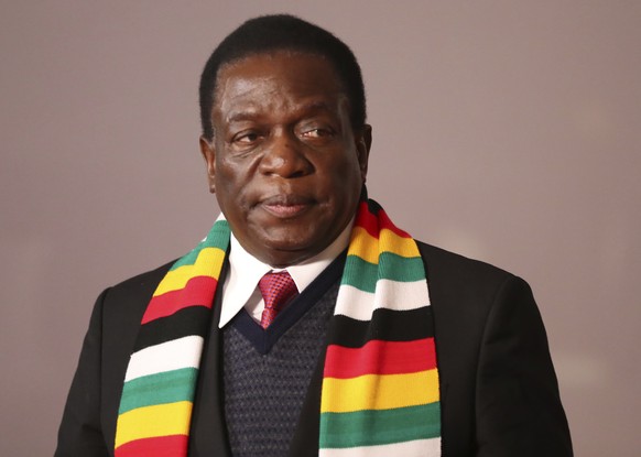 In this July 27, 2018, file photo, Zimbabwe&#039;s President Emmerson Mnangagwa attends the BRICS Summit in Johannesburg, South Africa. Zimbabwe&#039;s electoral commission said Friday, Aug. 3, Mnanga ...