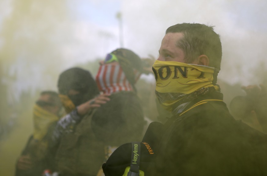 Members of Proud Boys gather for a rally in Portland, Oregon, U.S. September 26, 2020. REUTERS/Jim Urquhart