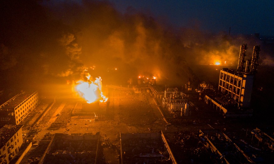 Smoke billows from fire following an explosion at the pesticide plant owned by Tianjiayi Chemical, in Xiangshui county, Yancheng, Jiangsu province, China March 21, 2019. Picture taken March 21, 2019.  ...