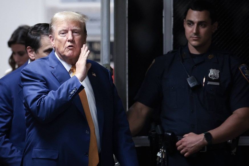 Former President Donald Trump returns to the courtroom after an afternoon break at Manhattan criminal court in New York on Tuesday, May 7, 2024. Trump s criminal trial is entering its fourth week on c ...