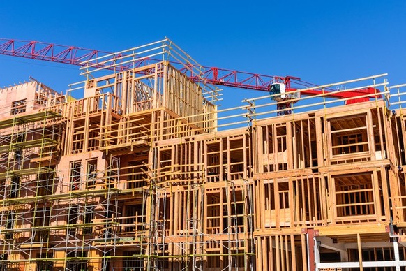 Exterior view of multifamily residential building under construction in Palo Alto; the entire Silicon Valley and San Francisco Bay Area is facing a housing crisis, with increased housing costs