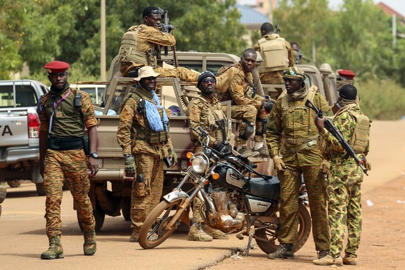 Soldiers loyal to Burkina Faso&#039;s latest coup leader Capt. Ibrahim Traore gather outside the National Assembly as Traore was appointed Burkina Faso&#039;s transitional president in Ouagadougou, Bu ...
