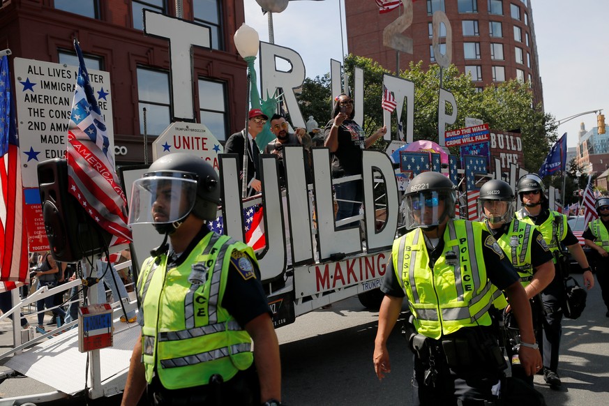 Police protect the Straight Pride Parade in Boston, Massachusetts, U.S., August 31, 2019. REUTERS/Brian Snyder