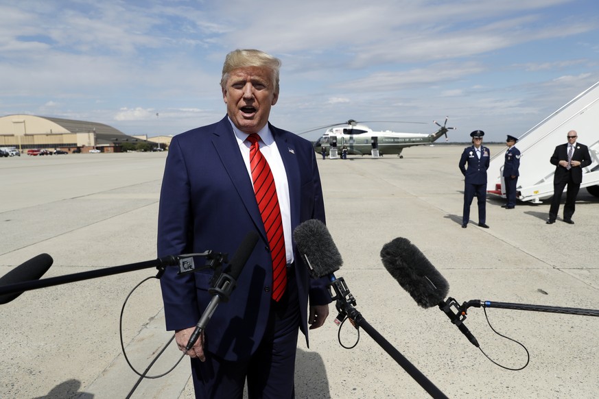 President Donald Trump speaks to the media after arriving at Andrews Air Force Base, Md., Thursday, Sept. 26, 2019. Trump had spent the week attending the United Nations General Assembly in New York(A ...
