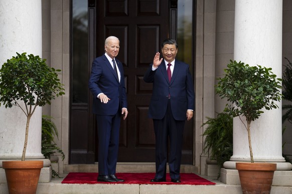 FILE - President Joe Biden greets China&#039;s President President Xi Jinping at the Filoli Estate in Woodside, Calif., on Nov, 15, 2023, on the sidelines of the Asia-Pacific Economic Cooperative conf ...