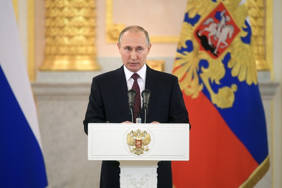 Russian President Vladimir Putin addresses newly-arrived foreign ambassadors as he received their credentials during a ceremony in the Kremlin in Moscow, Russia, Wednesday, April 11, 2018. (Alexei Dru ...