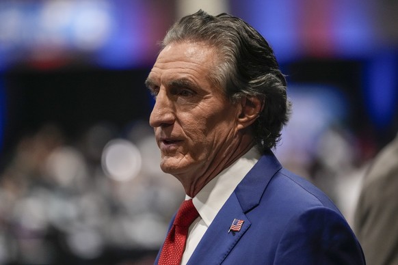 North Dakota Gov. Doug Burgum walking into the spin room before a presidential debate between Republican presidential nominee former President Donald Trump and Democratic presidential nominee Vice Pre ...