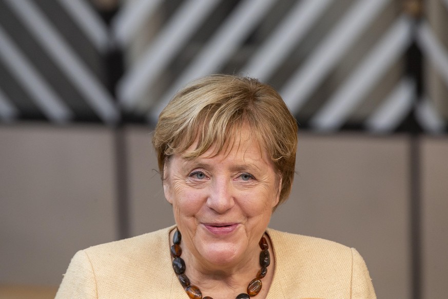 Chancellor of Germany Angela Merkel arrives for the European council summit, in Brussels, Thursday 21 October 2021. EU leaders will meet in Brussels to discuss COVID-19, digital transformation, energy ...