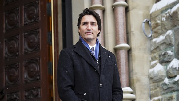 Prime Minister Justin Trudeau waits to greet Fumio Kishida Prime Minister of Japan on Parliament Hill in Ottawa on Thursday, Jan. 12, 2023.(Sean Kilpatrick /The Canadian Press via AP)