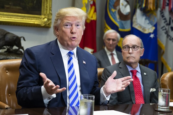 WASHINGTON, DC - MAY 11: (AFP OUT) U.S. President Donald J. Trump speaks with reporters during a meeting with automotive industries executives in the Roosevelt Room of the White House on May 11, 2018  ...