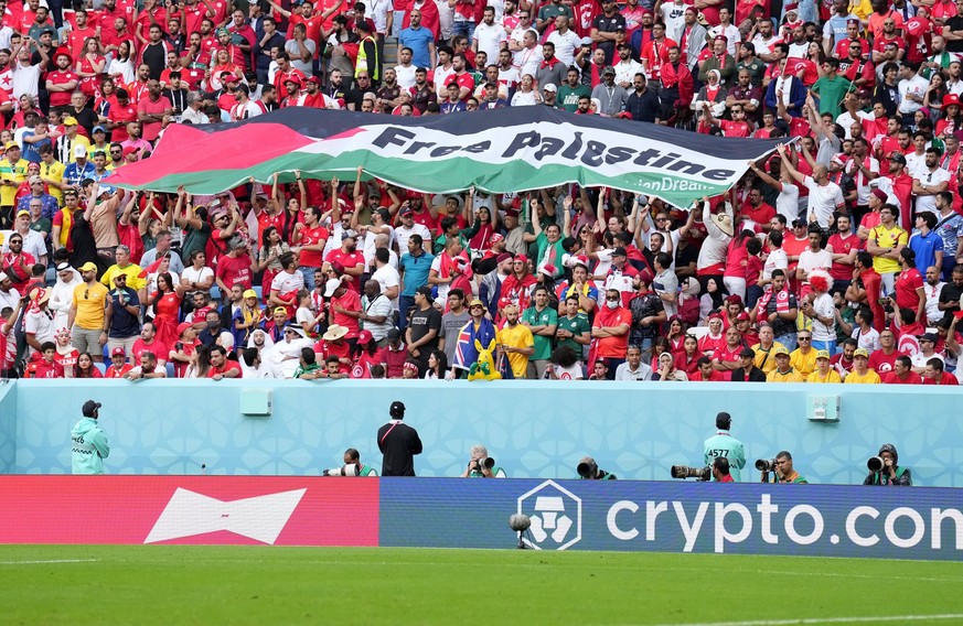 Tunisia v Australia - FIFA World Cup, WM, Weltmeisterschaft, Fussball 2022 - Group D - Al Janoub Stadium Tunisia fans hold up a Free Palestine banner during the FIFA World Cup Group D match at the Al  ...