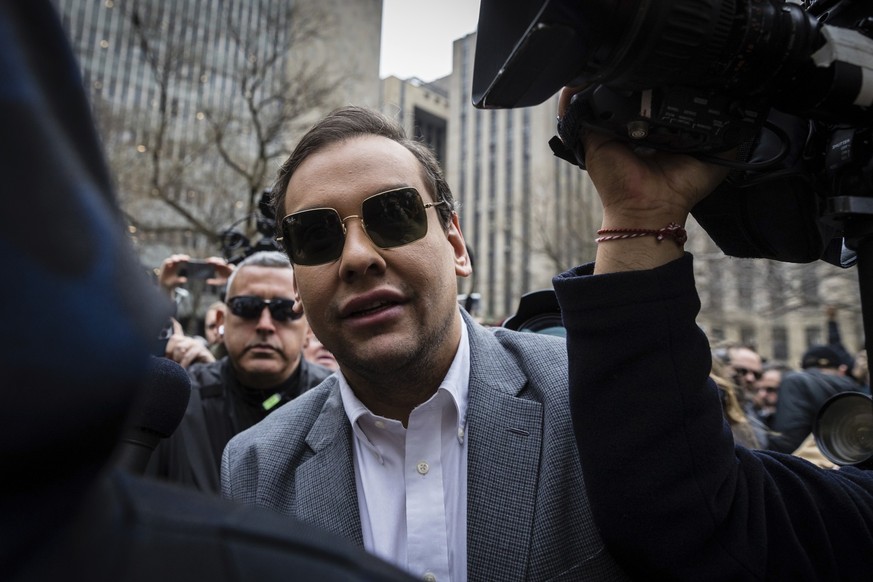 Rep. George Santos, R-N.Y., walks past the criminal courthouse at 100 Center Street in New York on Tuesday, April 4, 2023. (AP Photo/Stefan Jeremiah)