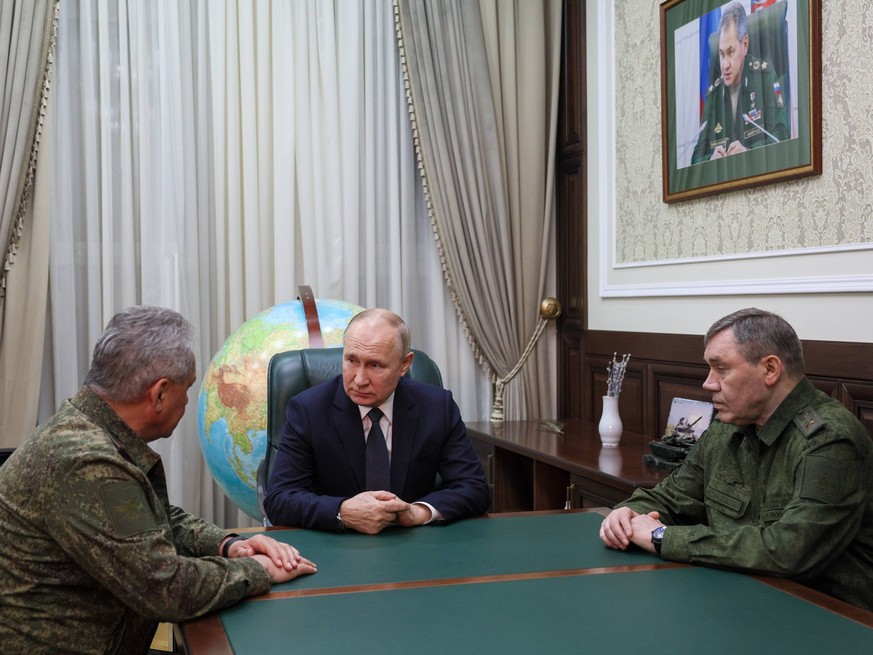 RUSSIA, ROSTOV-ON-DON - NOVEMBER 9, 2023: Russias Defence Minister Sergei Shoigu, Russias President Vladimir Putin, and Chief of the General Staff of the Russian Armed Forces Valery Gerasimov, L-R hol ...