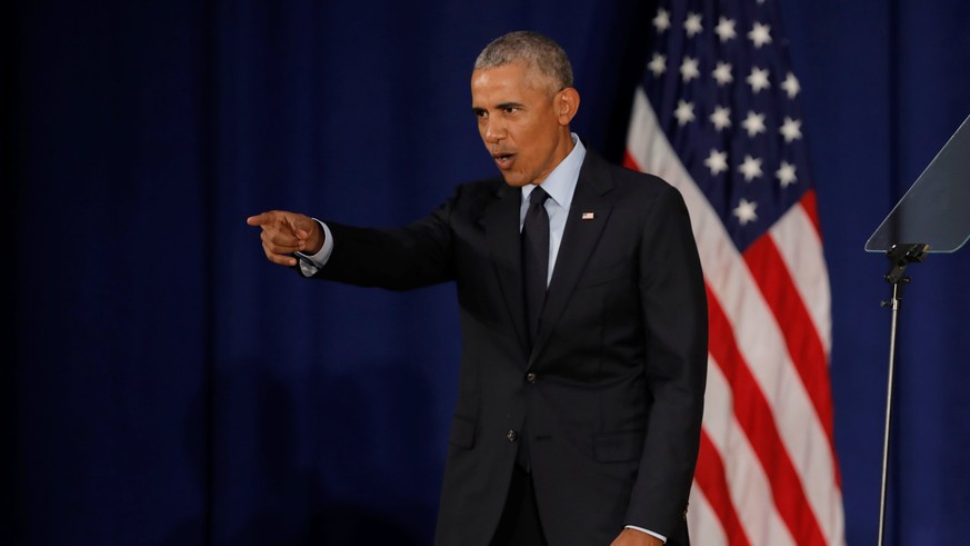 Former U.S. President Barack Obama leaves after speaking at the University of Illinois Urbana-Champaign in Urbana, Illinois, U.S., September 7, 2018. REUTERS/John Gress