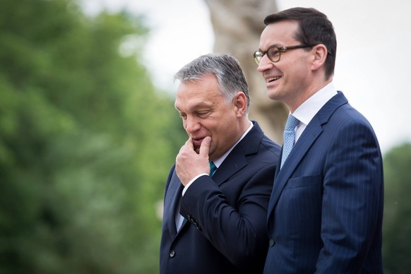 Polish Politics And More archives 2016-2022 Polish Prime Minister Mateusz Morawiecki welcomes Hungarian Prime Minister Viktor Orban in front of the Lazienki Palace in Warsaw, Poland on May 14, 2018 Wa ...