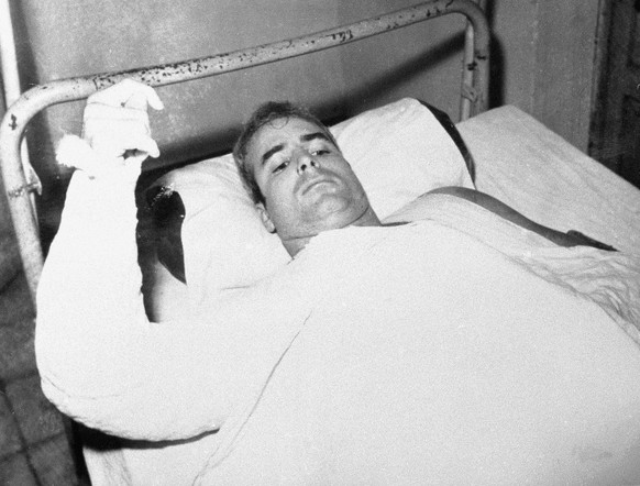 FILE - In this undated file photo provided by CBS, U.S. Navy Lt. Commander John S. McCain lies injured in North Vietnam. McCain, the war hero who became the GOP's standard-bearer in the 2008 election, ...