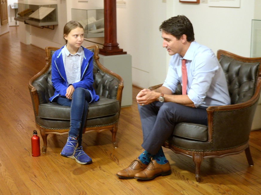 THE CANADIAN PRESS 2019-09-27. Canadian Prime Minister and Liberal leader Justin Trudeau speaks Swedish environmental activist Greta Thunberg in Montreal on Friday, September 27, 2019. THE CANADIAN PR ...