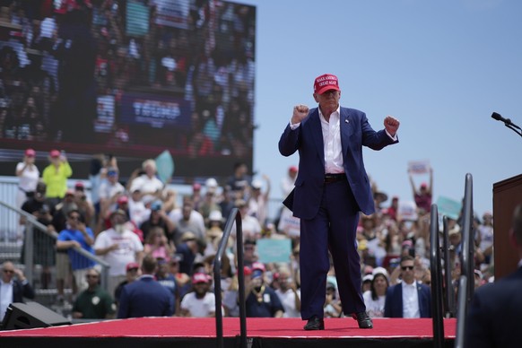 Republican presidential candidate, former President Donald Trump motions after speaking at a campaign rally Sunday, June 9, 2024, in Las Vegas. (AP Photo/John Locher)