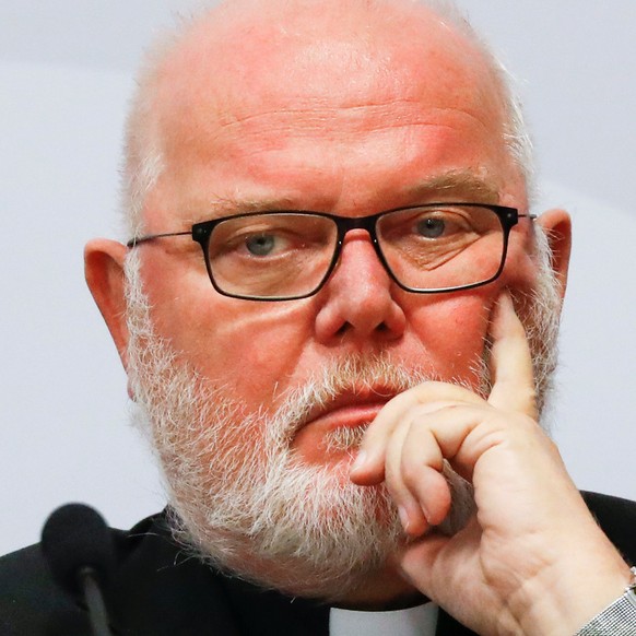 Cardinal Reinhard Marx, chairman of German Bishops&#039;s Conference attends a press conference to present the findings of a study into the report of sexual abuse by Catholic priests of thousands of c ...