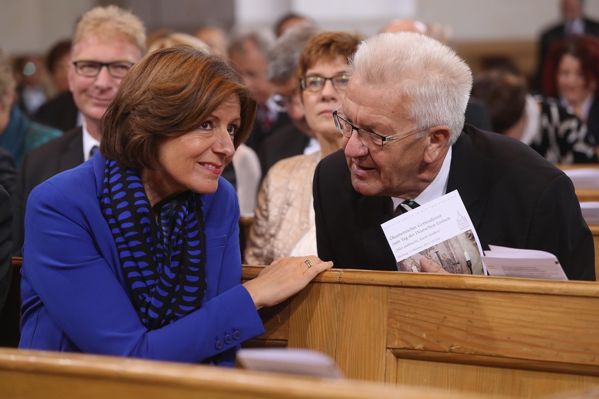 DRESDEN, GERMANY - OCTOBER 03: Governor of Rhineland-Palatinate Malu Dreyer (L) and Governor of Baden-Wuerttemberg Winfried Kretschmann arrive for a commemoratory service at the Frauenkirche church du ...