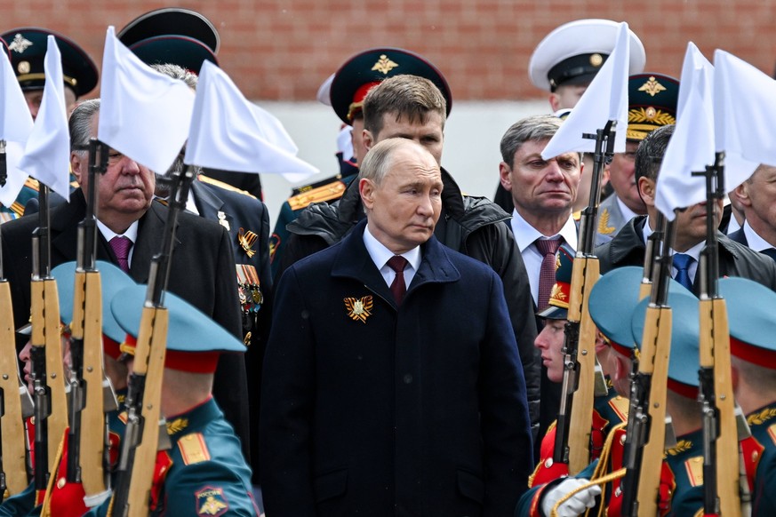 RUSSIA, MOSCOW - MAY 9, 2024: Russia s President Vladimir Putin C attends a ceremony to lay flowers at the Tomb of the Unknown Soldier in Alexander Garden on Victory Day marking 79th anniversary of th ...