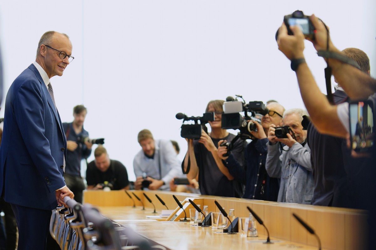 German Chancellor Friedrich Merz arrives for the annual press conference at the Federal Press Conference in Berlin, Germany, Friday, July 18, 2025. (AP Photo/Markus Schreiber)
