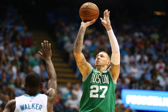 Sep 28, 2018; Chapel Hill, NC, USA; Boston Celtics forward Daniel Theis (27) shoots the ball against Charlotte Hornets guard Kemba Walker (15) in the second half at Dean E. Smith Center. Mandatory Cre ...