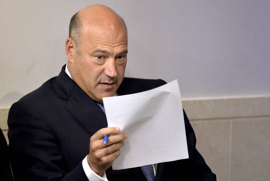 White House Economic Council Director Gary Cohn holds his paperwork prior to making remarks at the daily press briefing, at the White House, September 28, 2017, in Washington, DC. Cohn briefed the pre ...