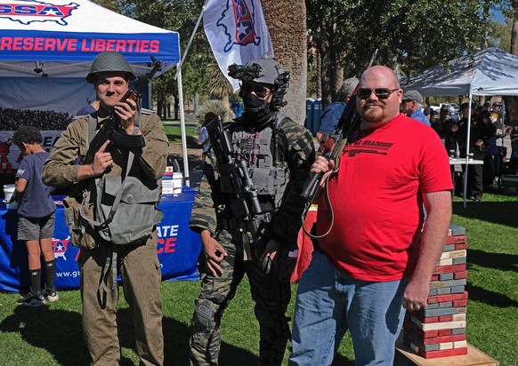 February 19, 2022, Phoenix, Arizona, U.S: Gun rights supporters hold rally at the Arizona State Capitol in support of the Second Ammendment. They oppose any new laws that restrict the right to bare ar ...