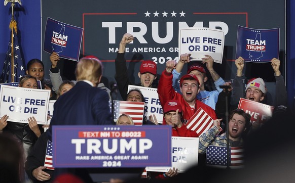 Former President Donald Trump speaks and is cheered by the crowd at a campaign rally, Saturday, Dec. 16, 2023, in Durham, N.H. (AP Photo/Reba Saldanha)