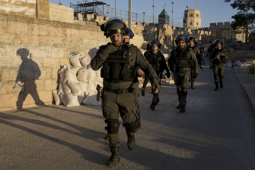 Israeli security forces gather during clashes with Palestinian demonstrators at the Al Aqsa Mosque compound in Jerusalem&#039;s Old City Friday, April 15, 2022. (AP Photo/Mahmoud Illean)