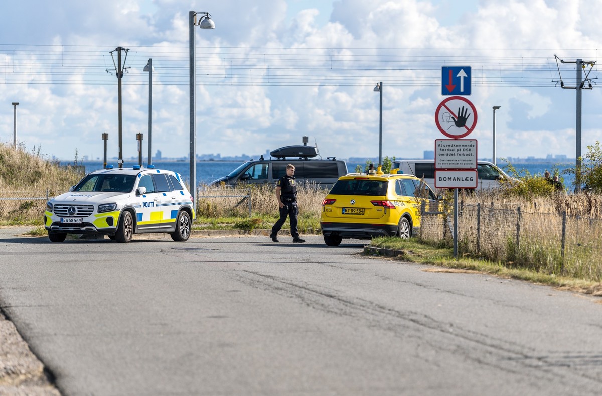 Danish police and Danish Security and Intelligence Service (PET) are present at DSB on Kystvejen by Copenhagen Airport, Tuesday, Sept. 23, 2025, after drones flew over Copenhagen Airport on Monday eve ...