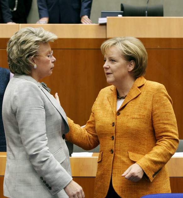 German Chancellor and current President-in-Office of the European Council, Angela Merkel (R) and Viviane Reding (L), commissioner for information society and media, talk during the plenary session of ...