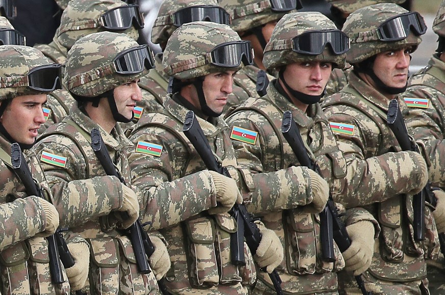 BAKU, AZERBAIJAN - DECEMBER 10, 2020: Azerbaijani soldiers are seen during a military parade marking the end of the Nagorno Karabakh military conflict. Valery Sharifulin/TASS PUBLICATIONxINxGERxAUTxON ...